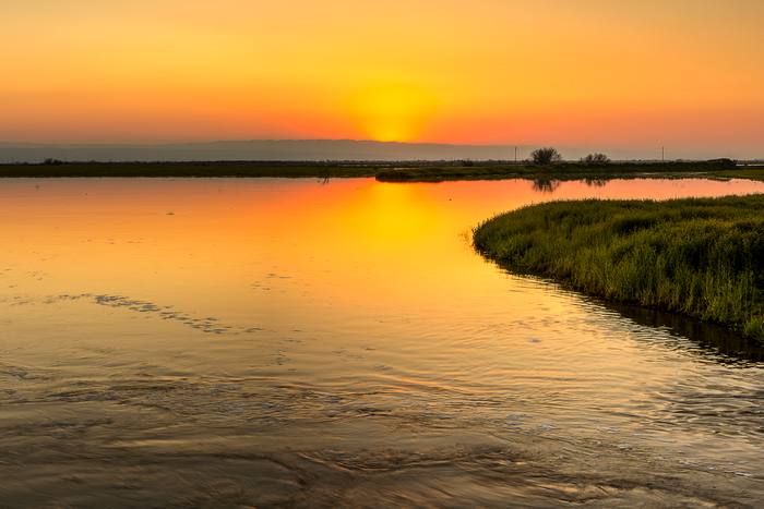 Kern River floodwater at sunset